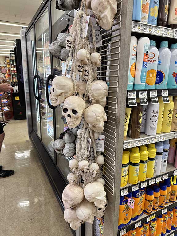 hanging skulls for halloween inside Vons Supermarket