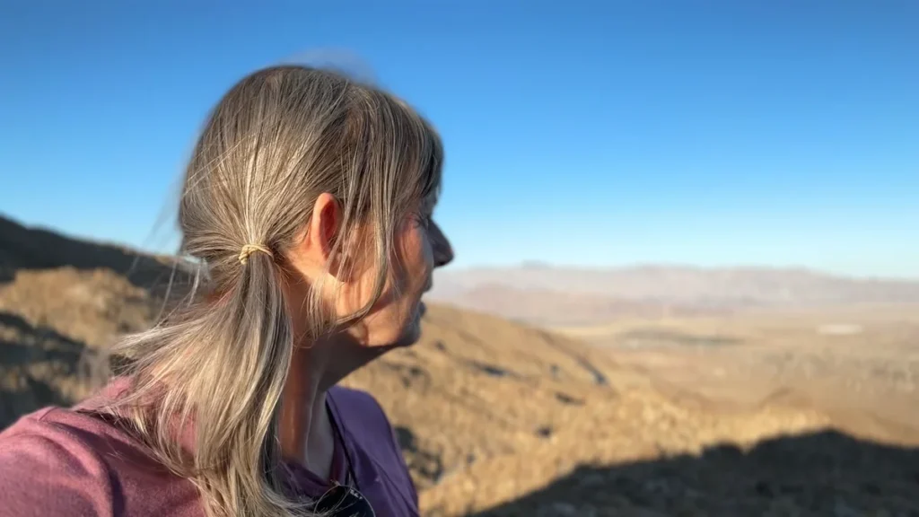 Side headshot of Josephine Mary Schmidt looking over the Borrego Springs mountain range