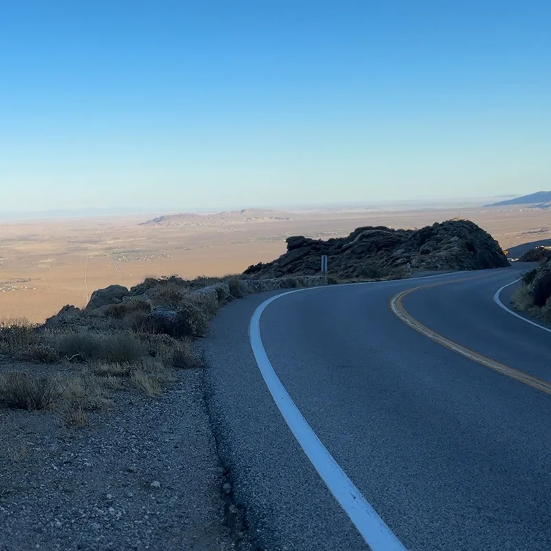 A road curving around the corner in the mountains in Borrego Springs ranges